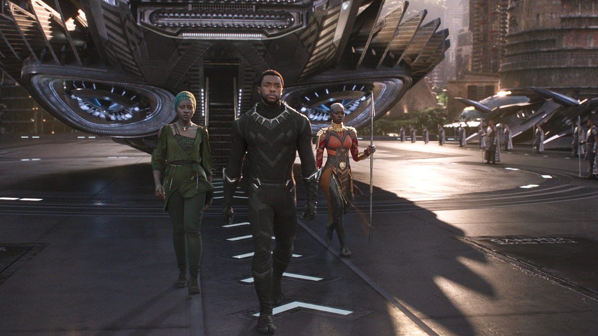 Marvel Studios' BLACK PANTHER..L to R: Nakia (Lupita Nyong'o), T'Challa/Black Panther (Chadwick Boseman) and Okoye (Danai Gurira)..Ph: Film Frame..©Marvel Studios 2018