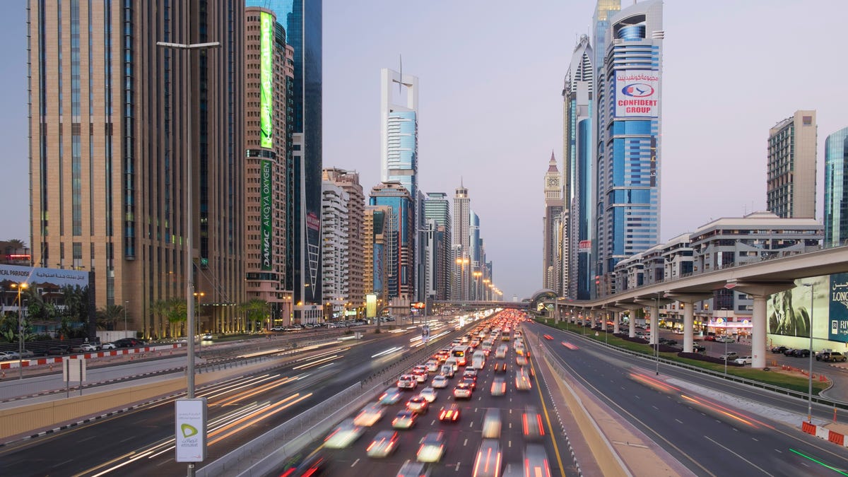 Evening view of skyscrapers and traffic.