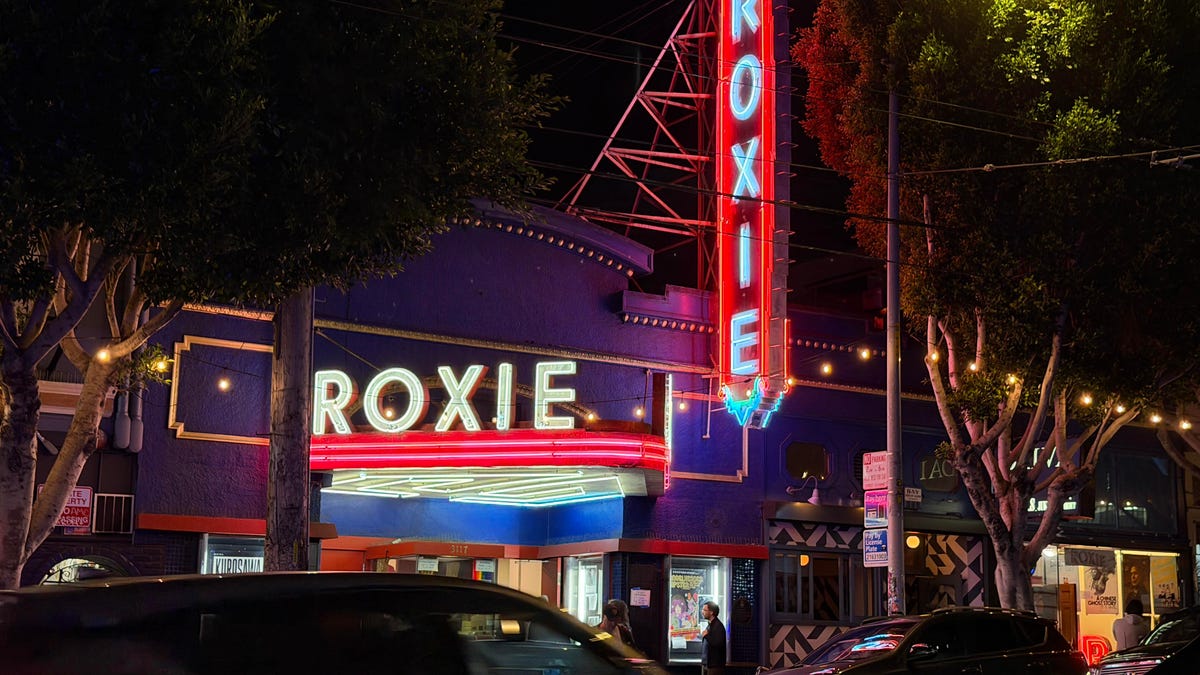 A movie theater's marquee at night