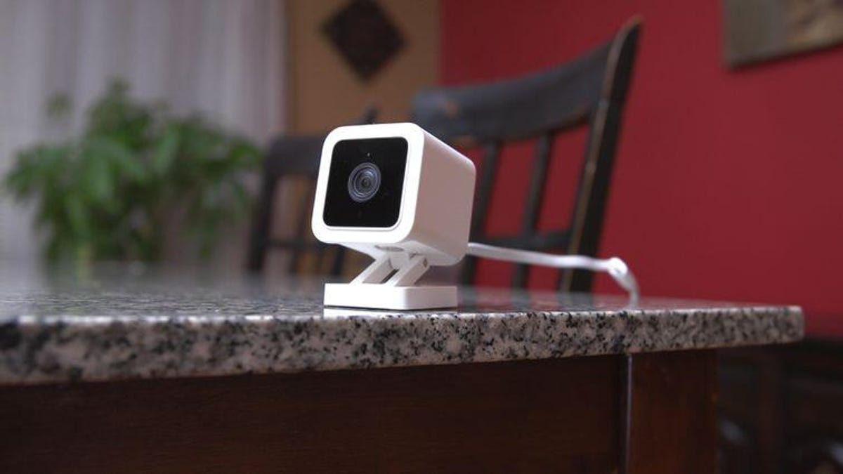 Wyze home security camera on kitchen table