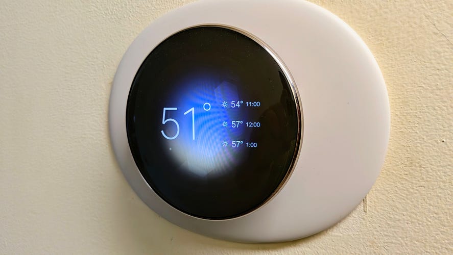Google Nest Learning Thermostat (4th gen) showing current temperatures outside