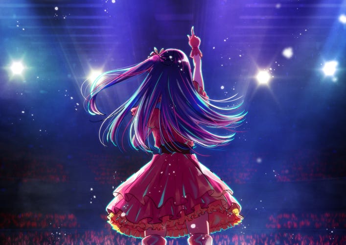 animated singer stands on stage facing the crowd