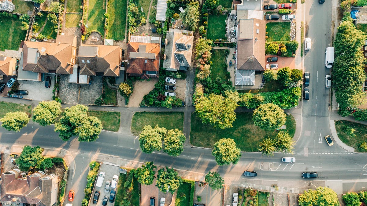 Bird's eye view of a suburban street with houses