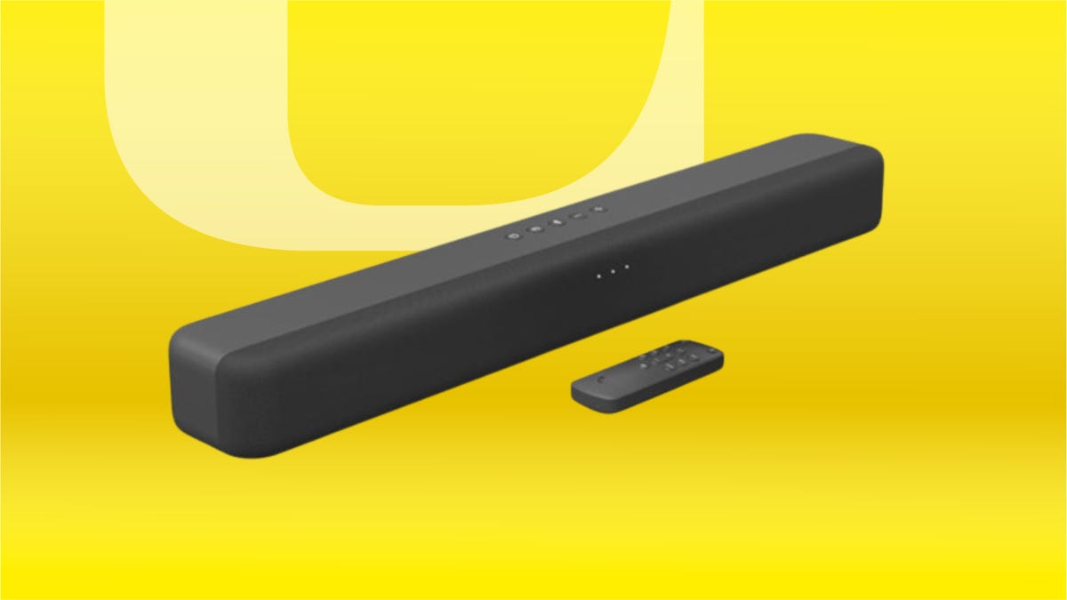 black Amazon soundbar and remote against yellow gradient CNET background.