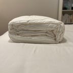 Silk and Snow Alt Down Duvet on bed