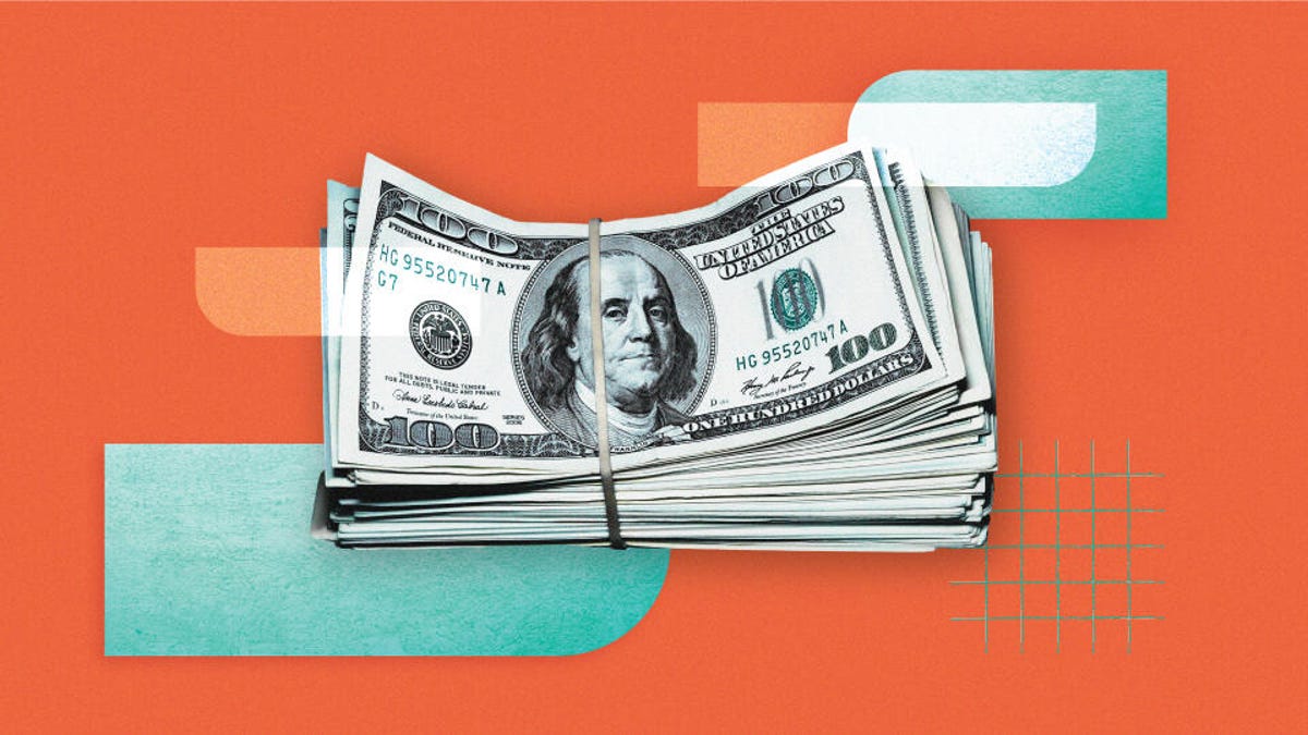 hundred dollar bills on an orange background