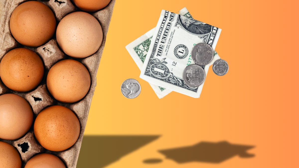 A carton of eggs next to dollar bills over an orange background
