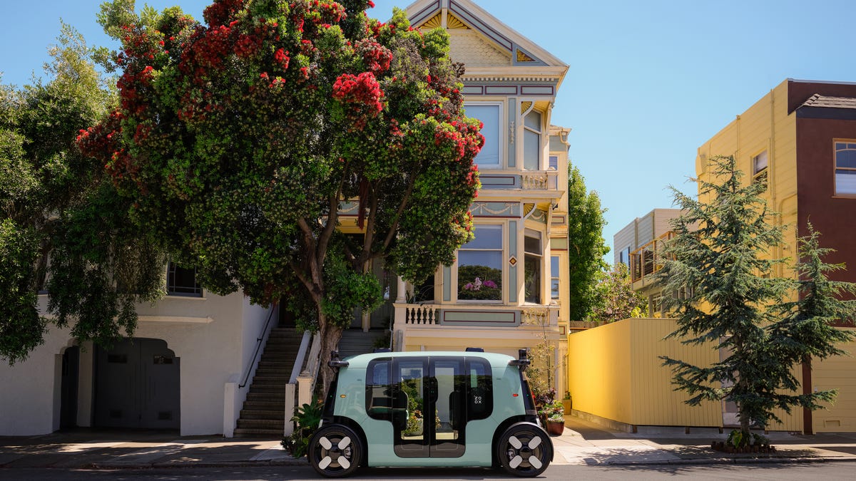 A Zoox robotaxi parked in front of a home in San Francisco
