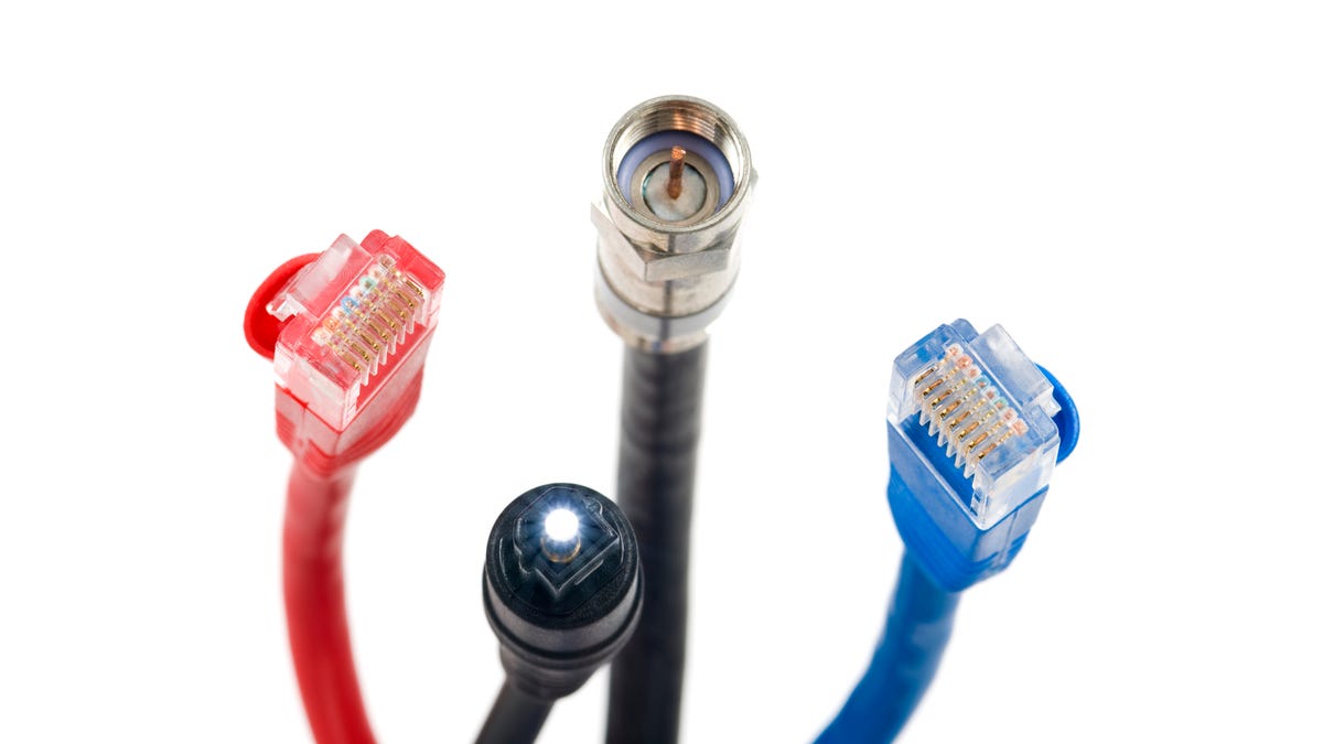 a coaxial cable and a fiber-optic cable between two Ethernet cables