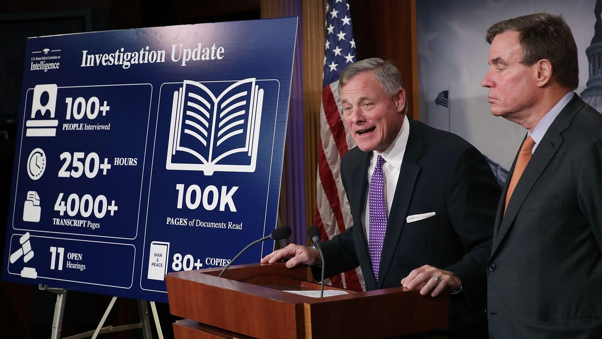Sens. Richard Burr (left) and Mark Warner deliver an update on an inquiry into Russian interference in the 2016 presidential election.