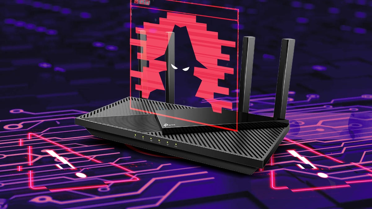 hands connecting internet cable to router with antennas on table and pink background