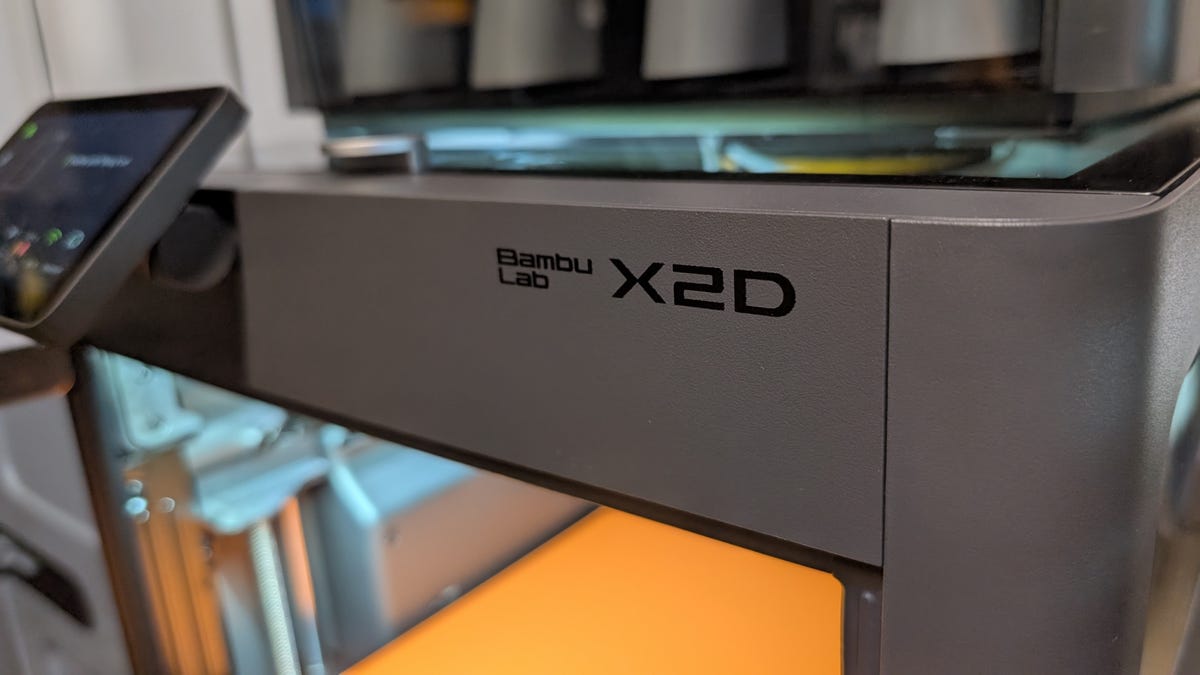 The logo of the X2D 3D printer on the edge of the printer itself