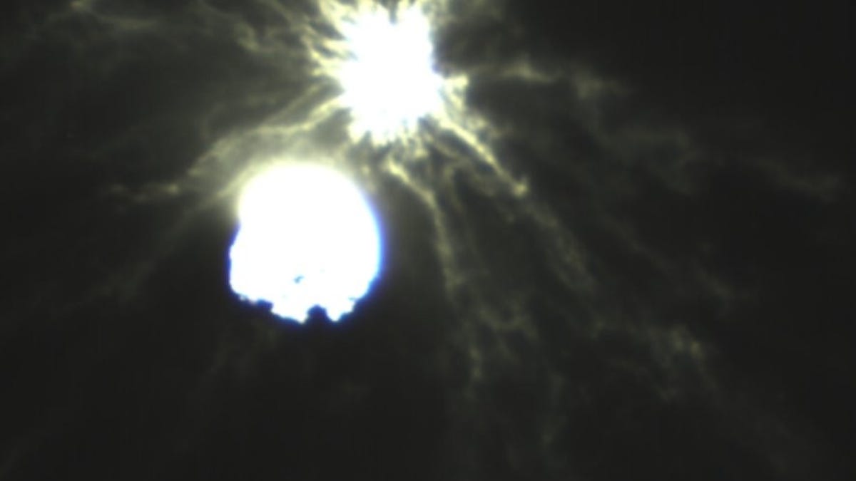 Didymos and Dimorphos as bright white lights