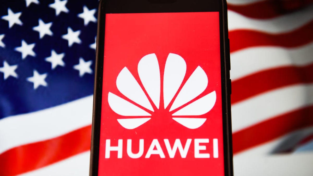 In this photo illustration a Huawei logo seen displayed on a