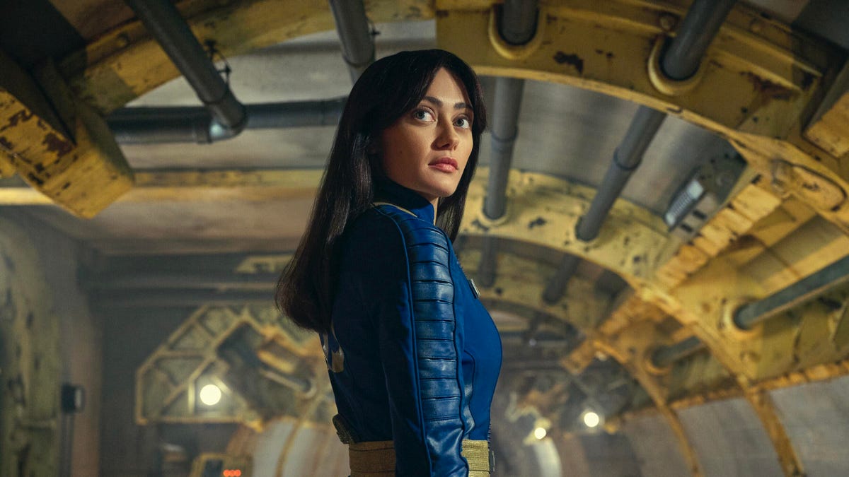 a woman in a blue uniform