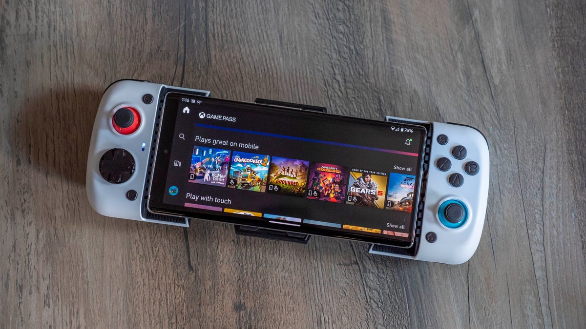 Gamesir X3 Type-C mobile Android game controller holding a Google Pixel 6 Pro phone with Xbox Game Pass app open on the screen.