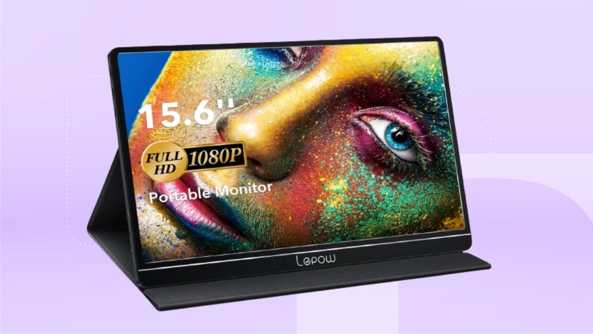 Black portable monitor against lavender background