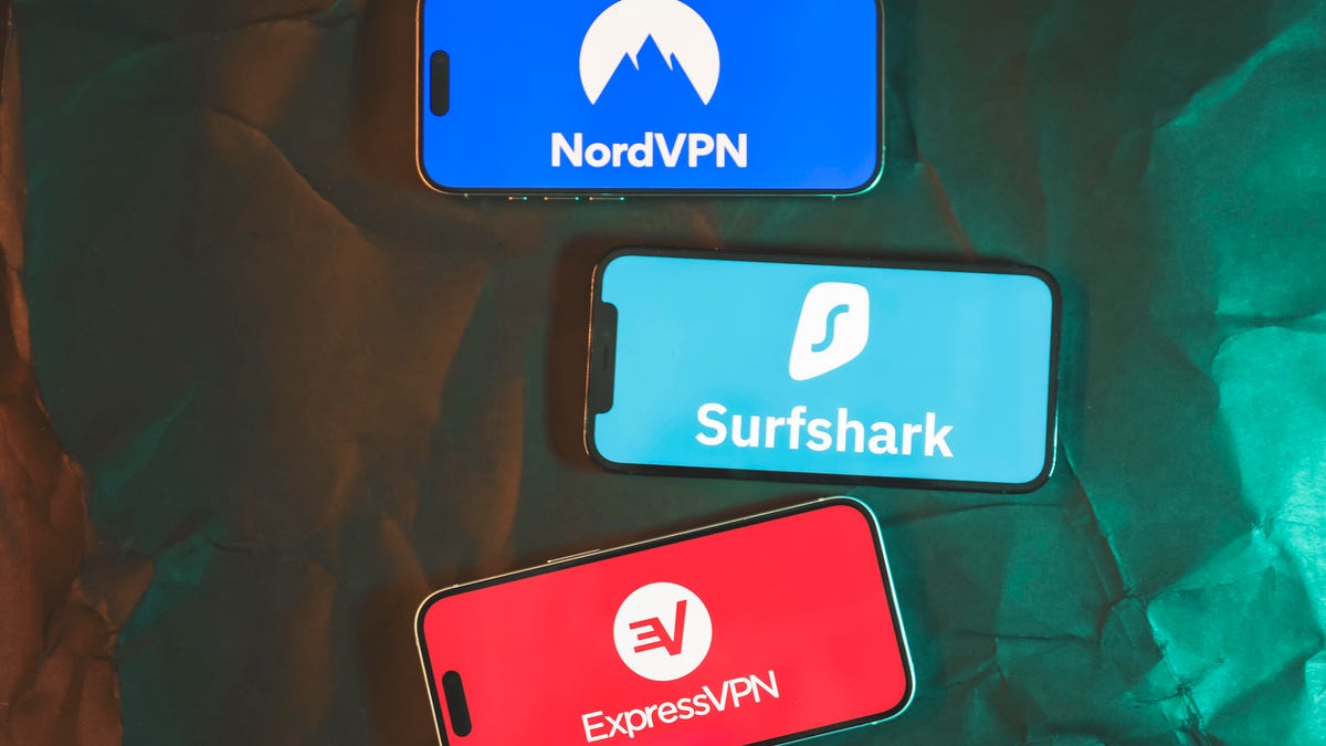 Surfshark, NordVPN and Express VPN shown on mobile phones