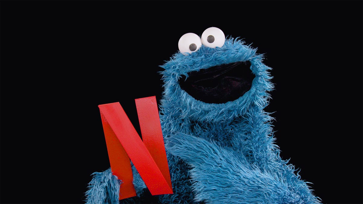 cookie monster holds Netflix N logo