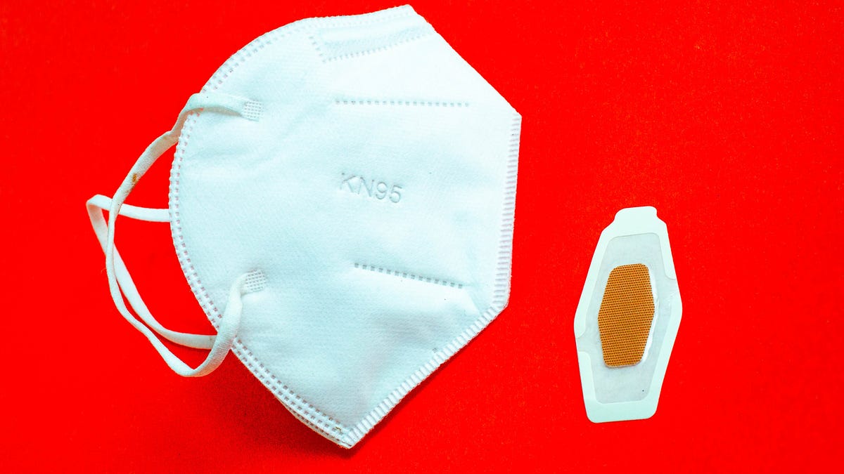 covid-19-masks-booster-shots-vaccines-syringes-bandaids-winter-2021-cnet-067