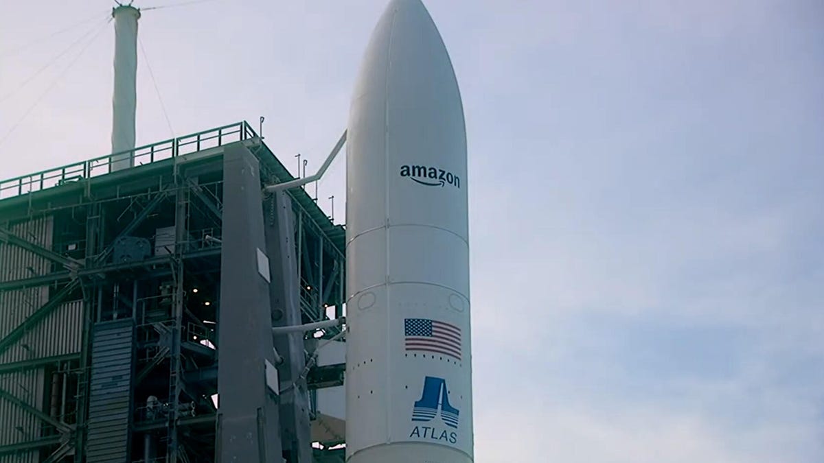 closeup of a rocket with Amazon logo and a US flag