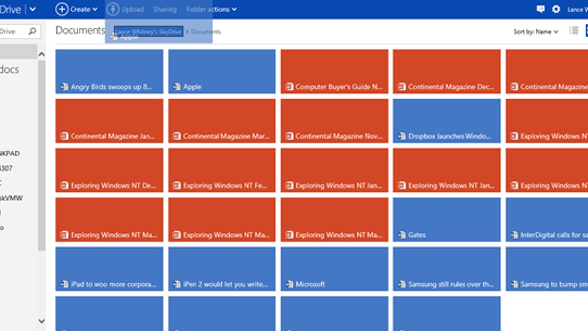 You can now drag and drop files within SkyDrive to move them.