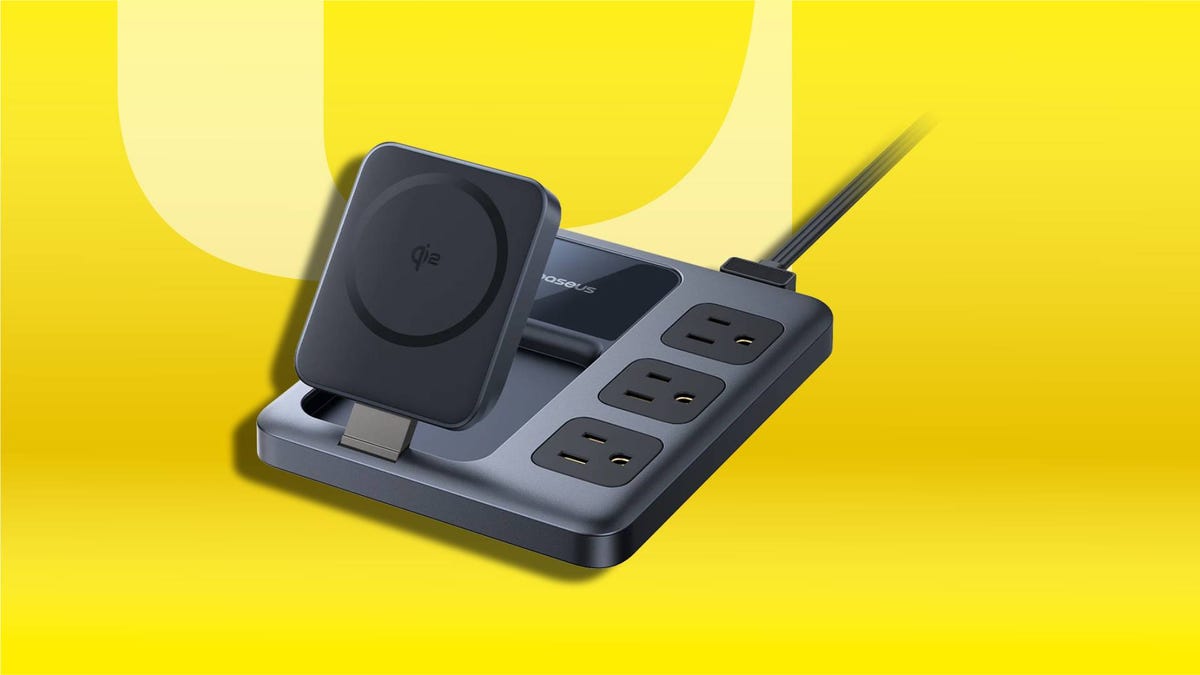 A Baseus Nomos 8-in-1 charger on a yellow CNET background.