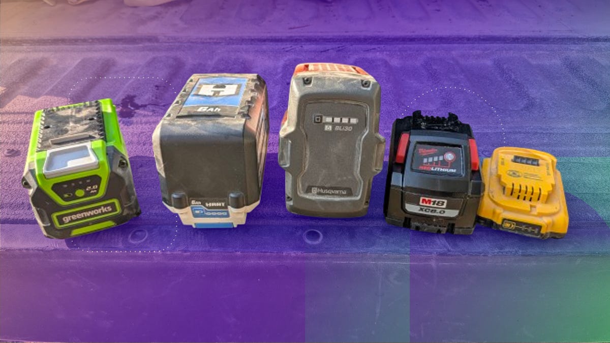 Yard equipment tool batteries on a tailgate