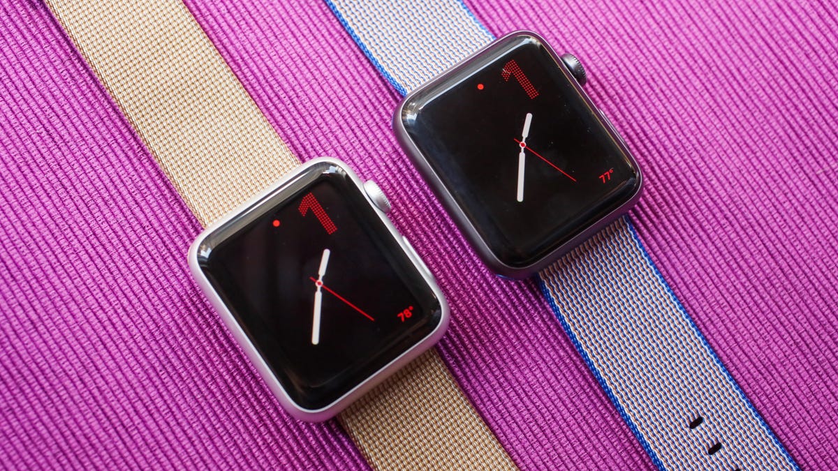 Two series 1 Apple Watches are shown