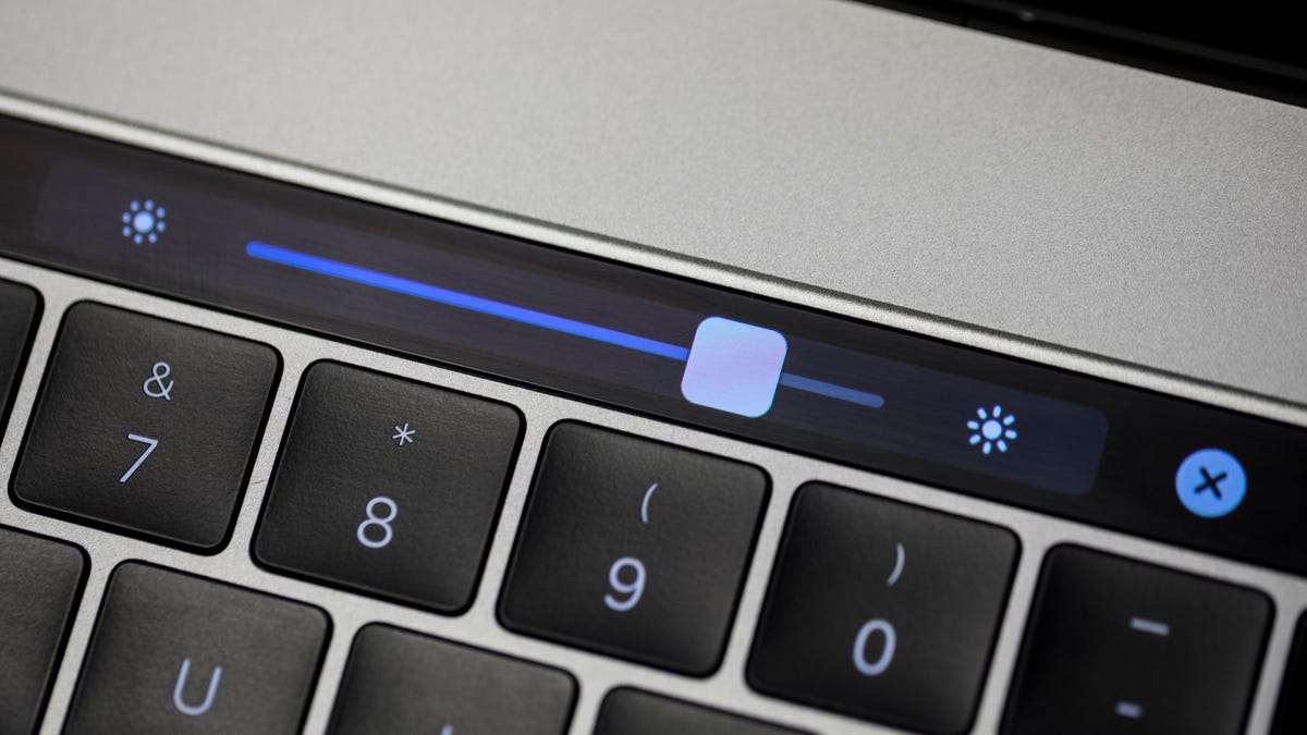 The 2016 MacBook Pro Touch Bar lets you dim the laptop's screen to save power.​