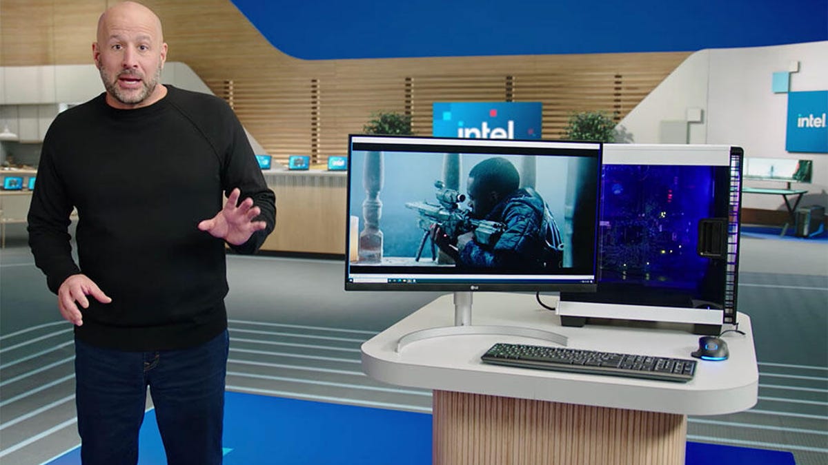 Greg Bryant, leader of Intel's PC chip business, shows a computer running Windows on the next-gen Alder Lake processor at CES 2021.