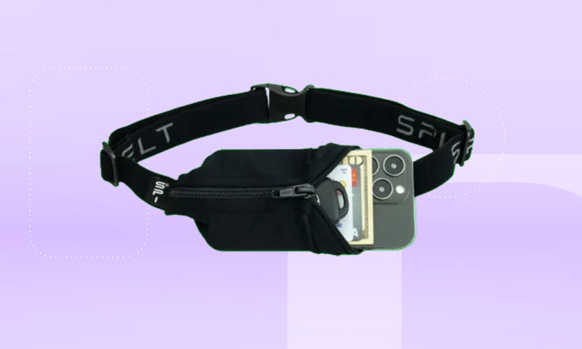 Black SPIbelt Running Belt against a lilac background.