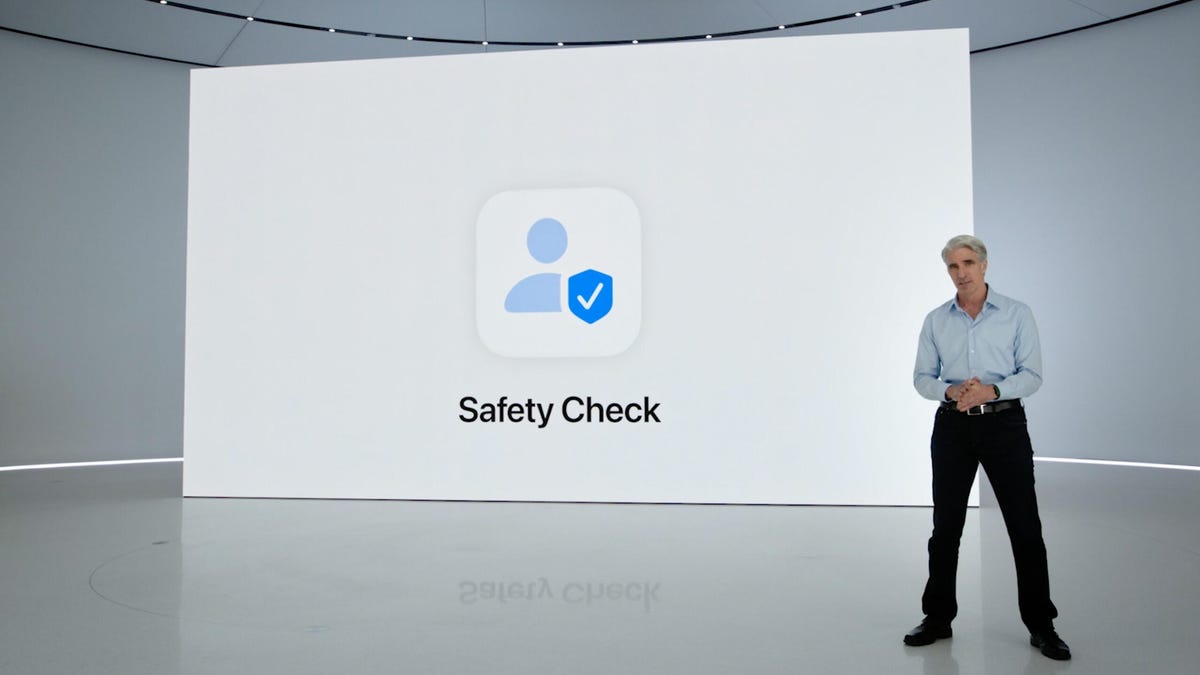 Safety Check and Privacy screen during the Apple event with speaker in front