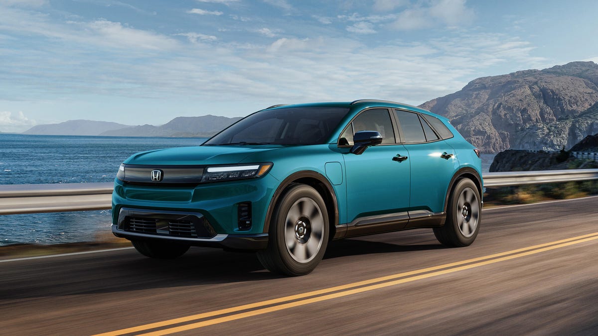 2024 Honda Prologue Elite in motion on a coastal highway