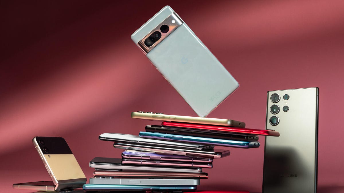 Several phones stacked on top of each other