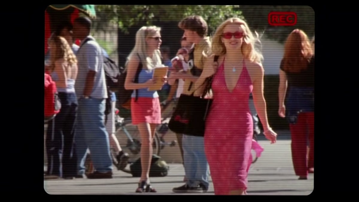 Elle Woods walking in pink dress in Legally Blonde