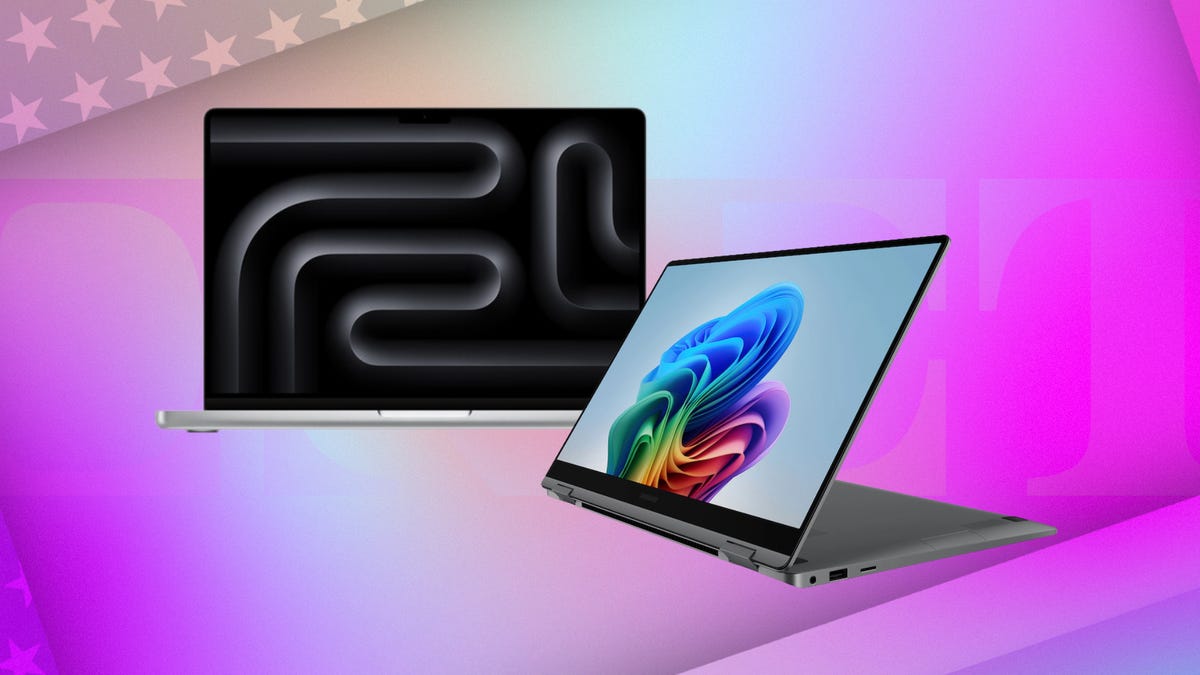 Two open laptops against a pink gradient CNET background.