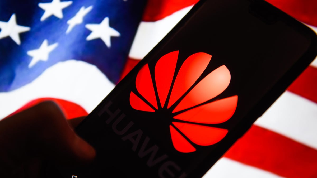 Huawei logo is seen on an android mobile phone with United