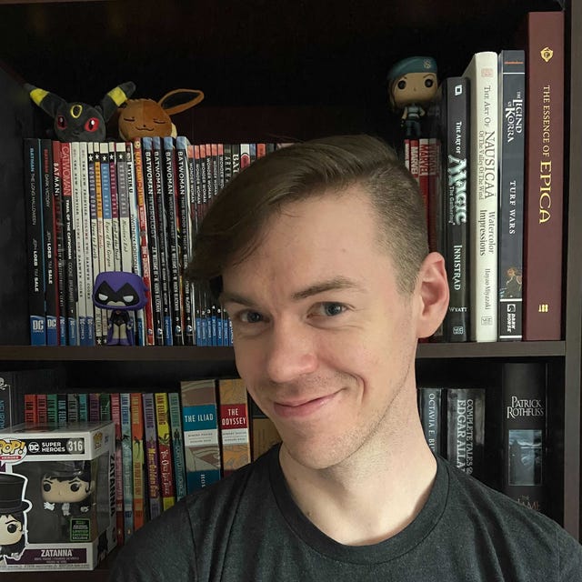 Headshot of Adam Benjamin