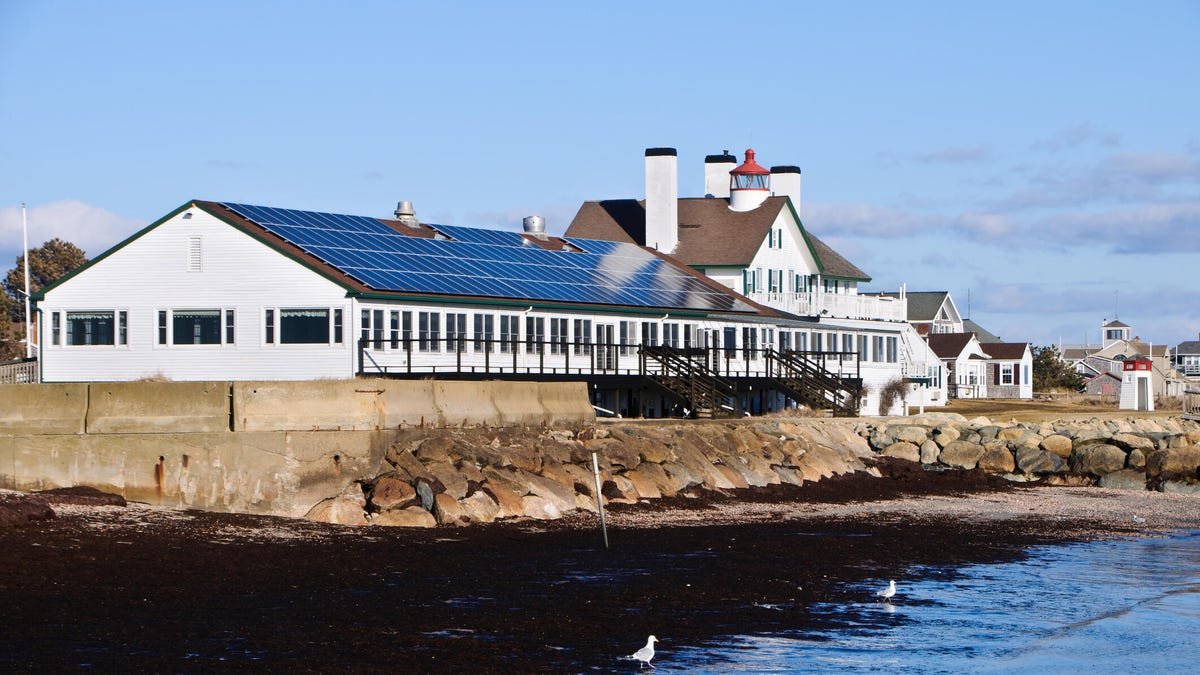 A Cape Cod inn covered in solar panels