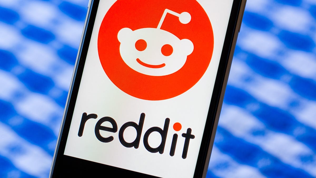 Reddit logo on a phone screen