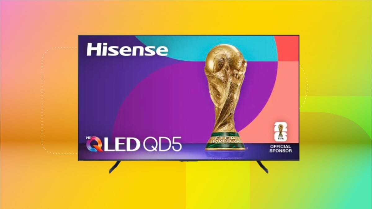 98-inch Hisense TV against coral, yellow and mint green CNET background.