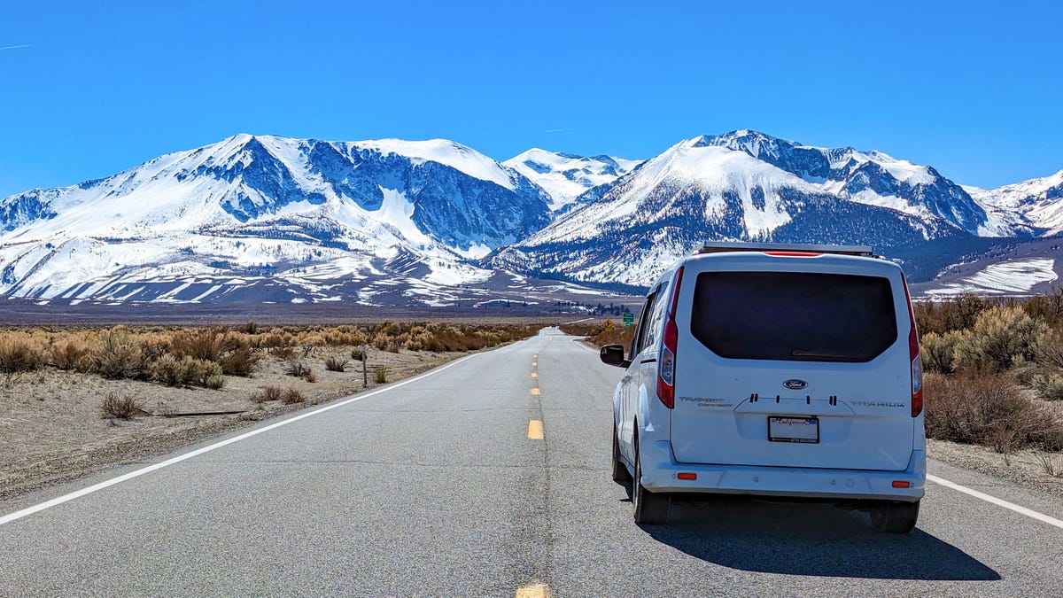 A campervan with mountains