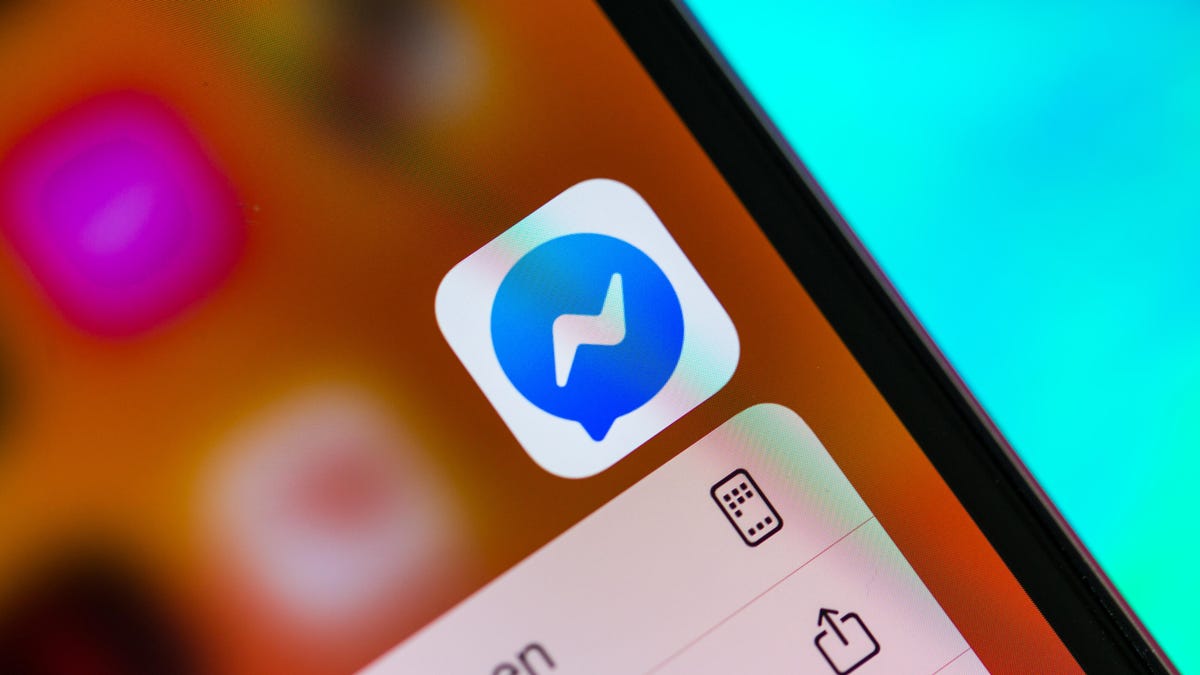 Facebook Messenger app icon on a phone