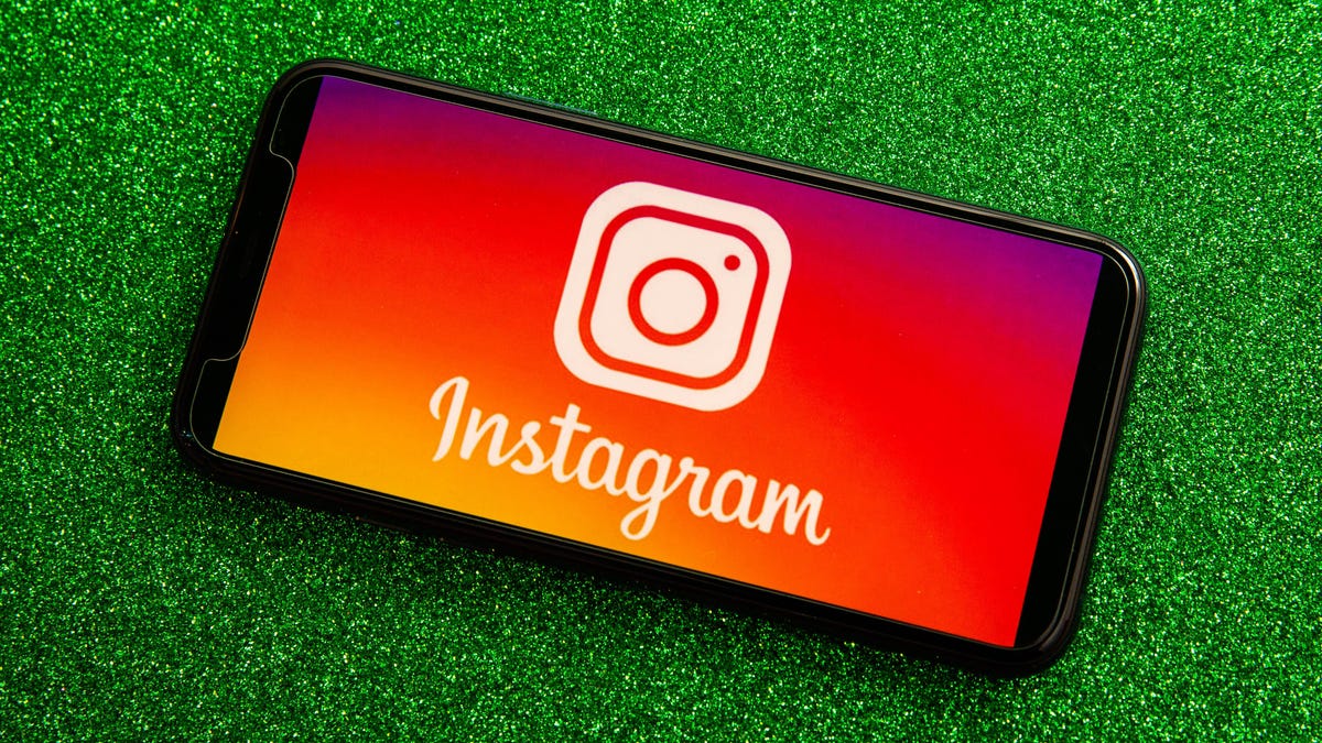 004-instagram-app-logo-on-phone-2021