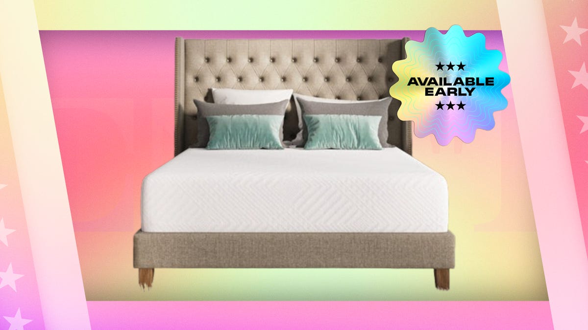 Shows the Ego Home Dreamer Mattress on a bed frame with six pillow on a multicolored background.