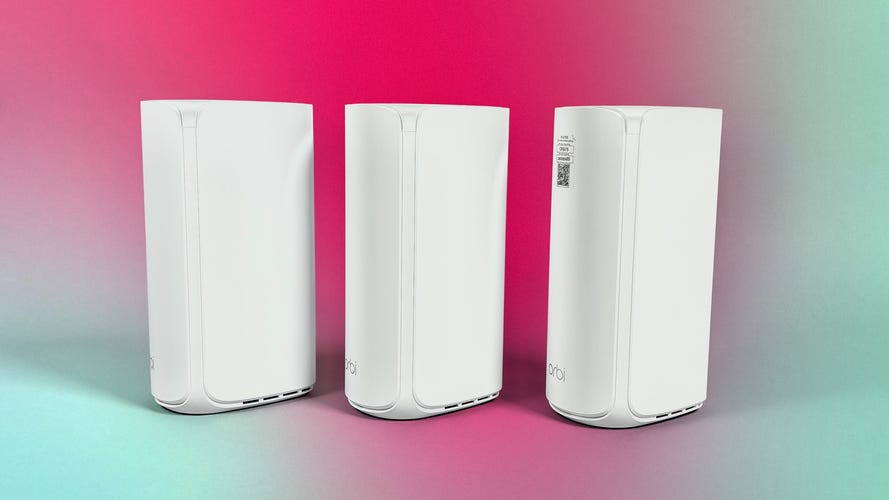 image of three white Wi-Fi routers