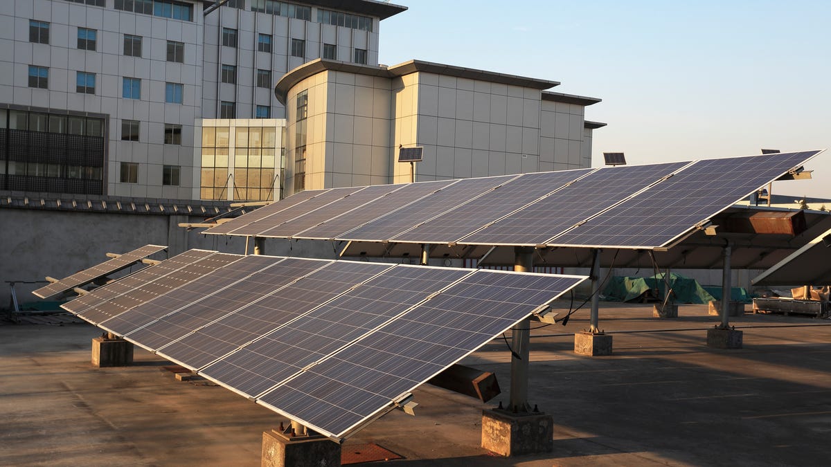 Solar panels on top of a building.
