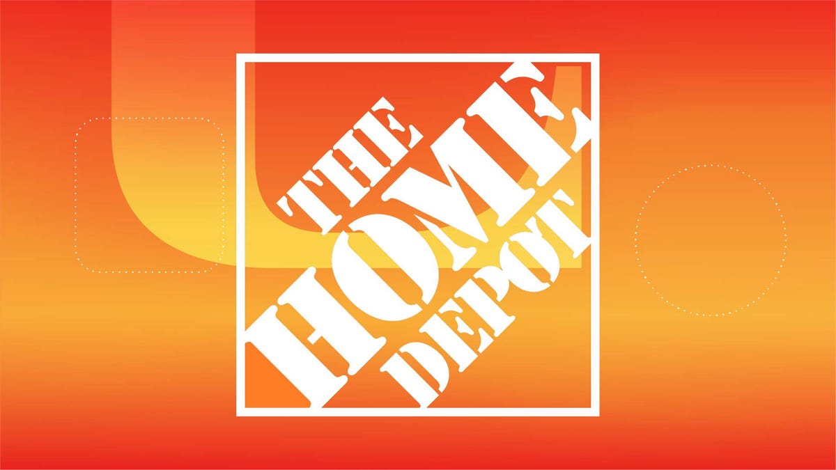The Home Depot logo in white against an orange gradient CNET background.