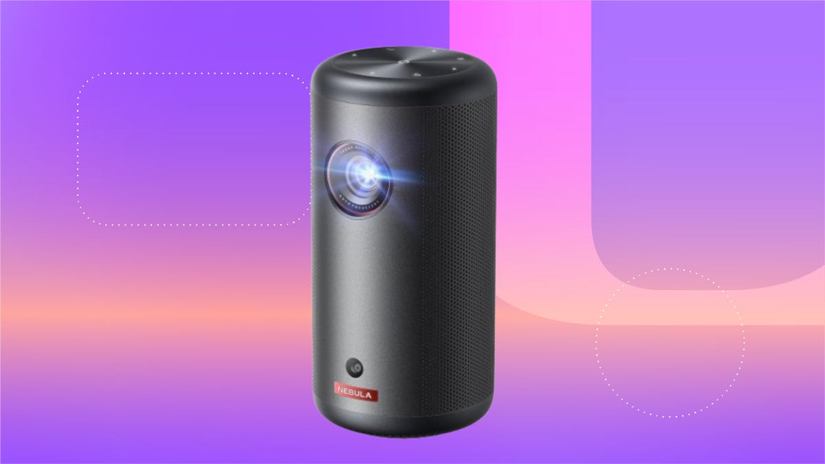 Nebula Capsule 3 projector against a purple background